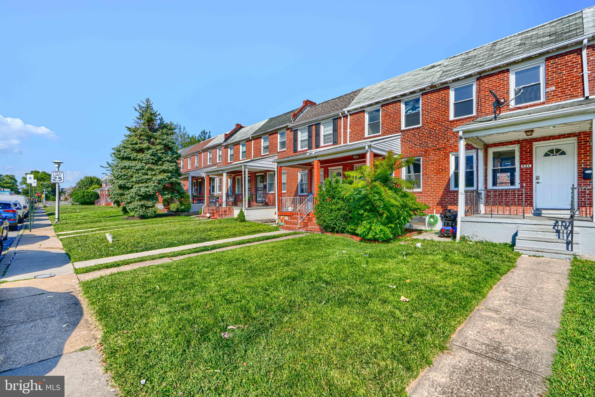 435 Joplin Street Baltimore, MD 21224 - Photo 2 of 30 Charming brick row homes with lush lawns.