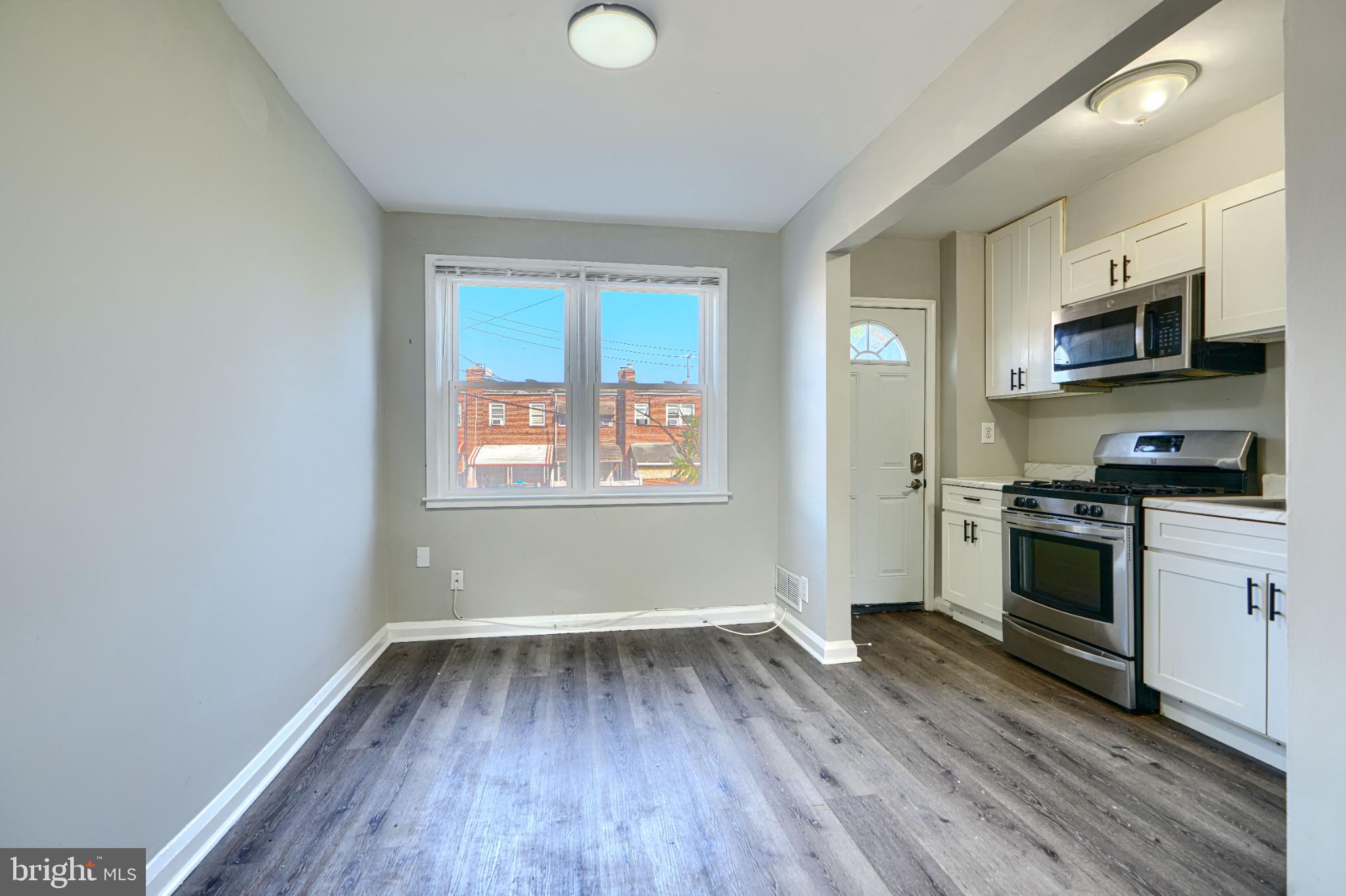 435 Joplin Street Baltimore, MD 21224 - Photo 7 of 30 Bright and airy kitchen with modern finishes.