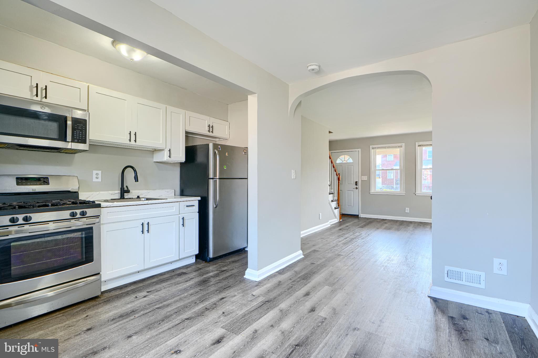 435 Joplin Street Baltimore, MD 21224 - Photo 8 of 30 Modern kitchen with open living space.