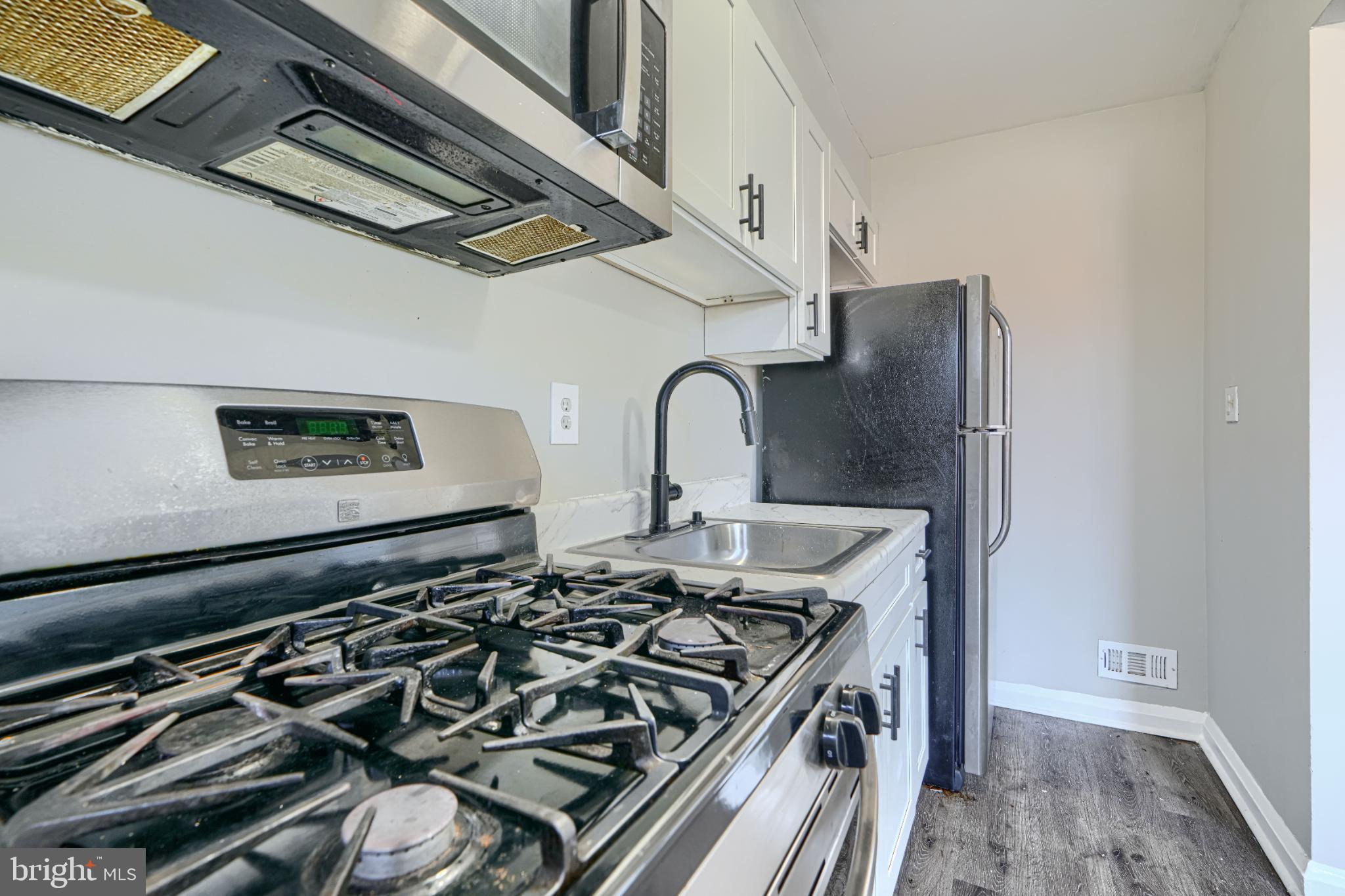 435 Joplin Street Baltimore, MD 21224 - Photo 10 of 30 Modern kitchen with sleek appliances.