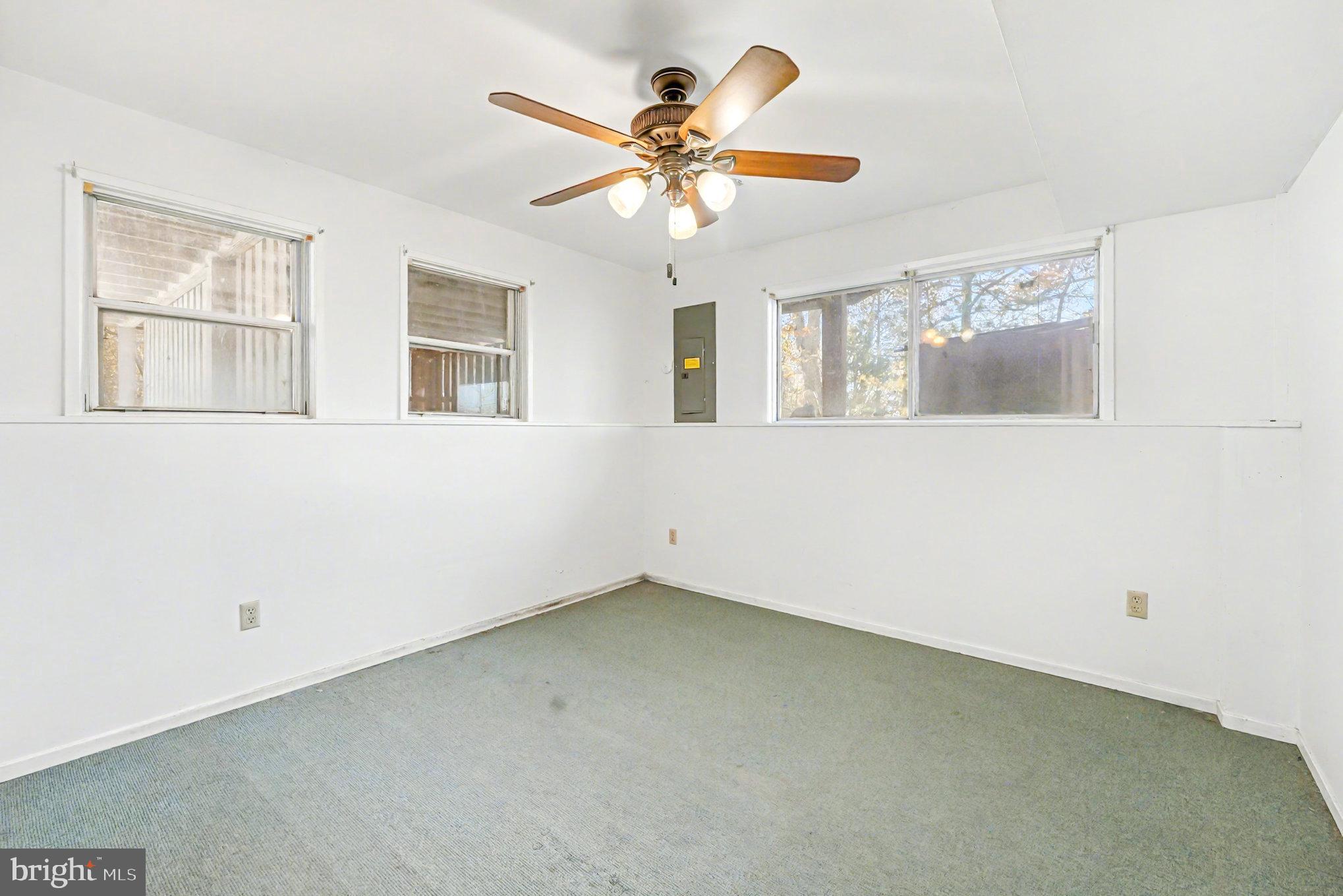 16031 Arthur Road King George, VA 22485 - Photo 21 of 26 a view of an empty room with a window