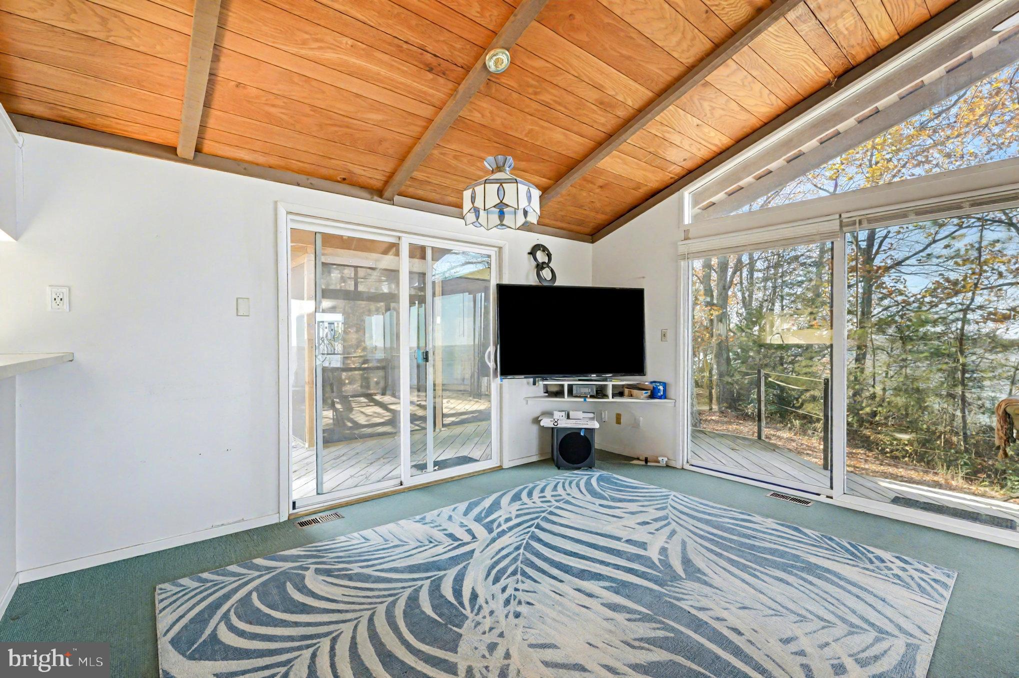 16031 Arthur Road King George, VA 22485 - Photo 10 of 26 a bedroom with furniture a flat screen tv and a bed