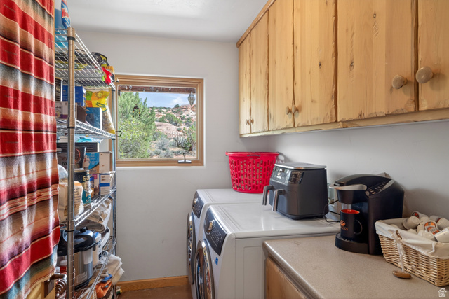 3617 Red Rock Drive Moab, UT 84532 - Photo 33 of 79 Laundry area with cabinet space and independent washer and dryer
