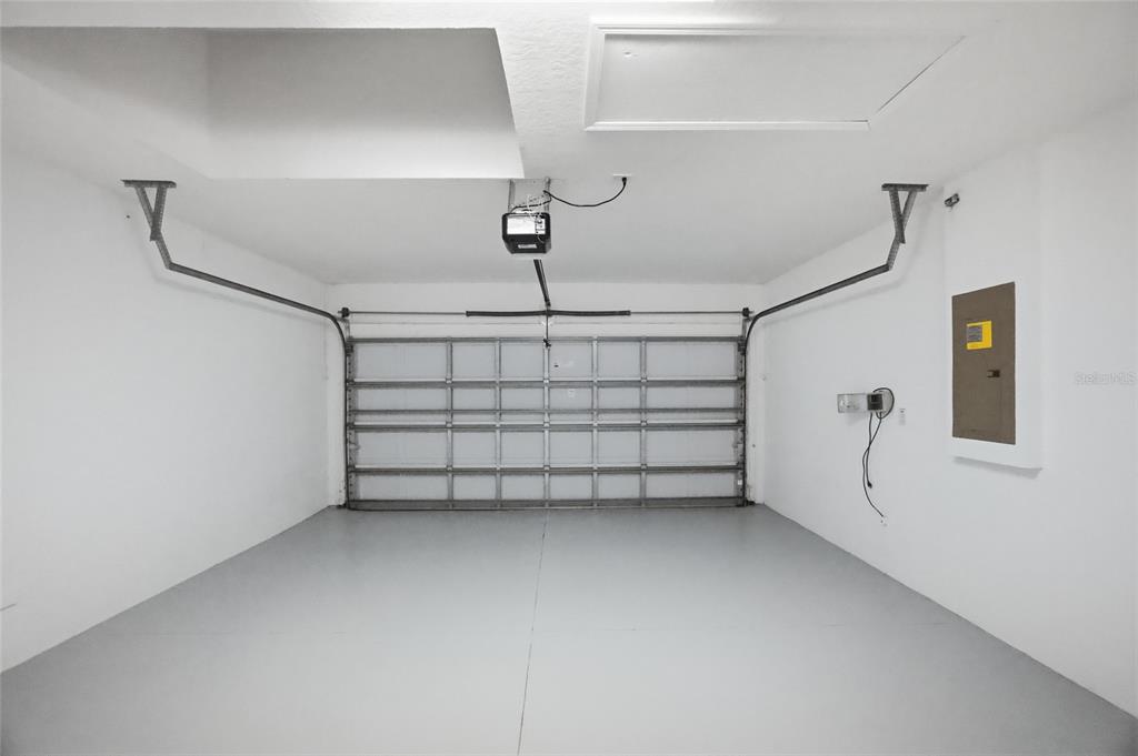 13323 Bainbridge Way Spring Hill, FL 34609 - Photo 25 of 33 a view of a garage