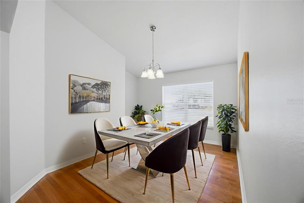 13323 Bainbridge Way Spring Hill, FL 34609 - Photo 4 of 33 a dining room with furniture and window
