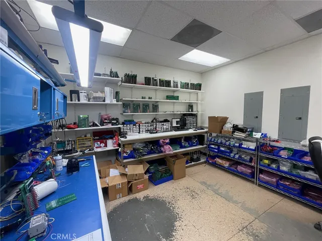 a room with lots of furniture and clutter