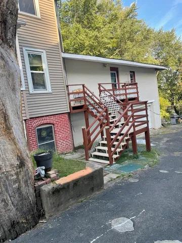 a front view of a house with a garage
