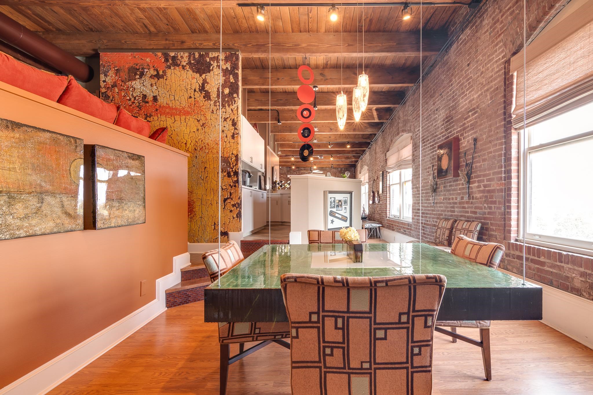 262 Wagner Place, Unit 402 Memphis, TN 38103 - Photo 32 of 40 a view of a dining room with furniture and wooden floor