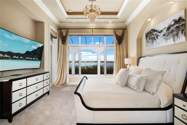 a spacious bathroom with a granite countertop tub sink a mirror a shower and vanity