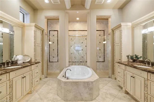 a view of a hallway with wooden floor and entryway