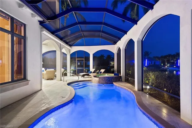 a utility room with sink dryer and washer