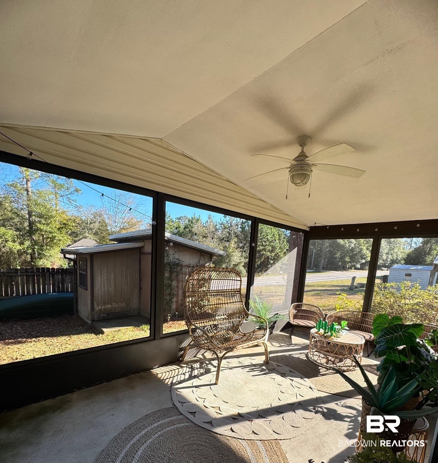 1434 Ridgewood Drive Lillian, AL 36549 - Photo 8 of 45 Sunroom / solarium featuring ceiling fan and vaulted ceiling