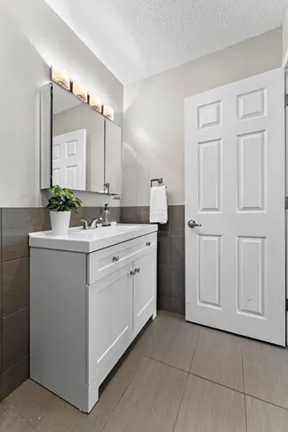 a utility room with cabinets