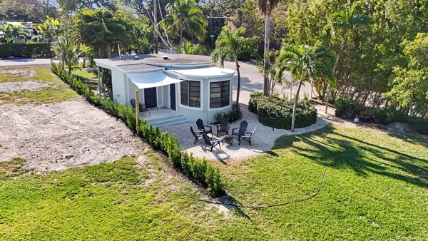a view of a lake with a building in the background