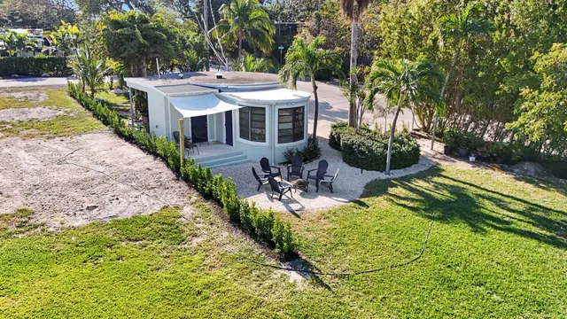 a view of a lake with a building in the background