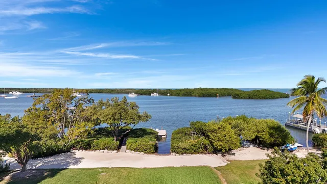 a view of lake with a beach
