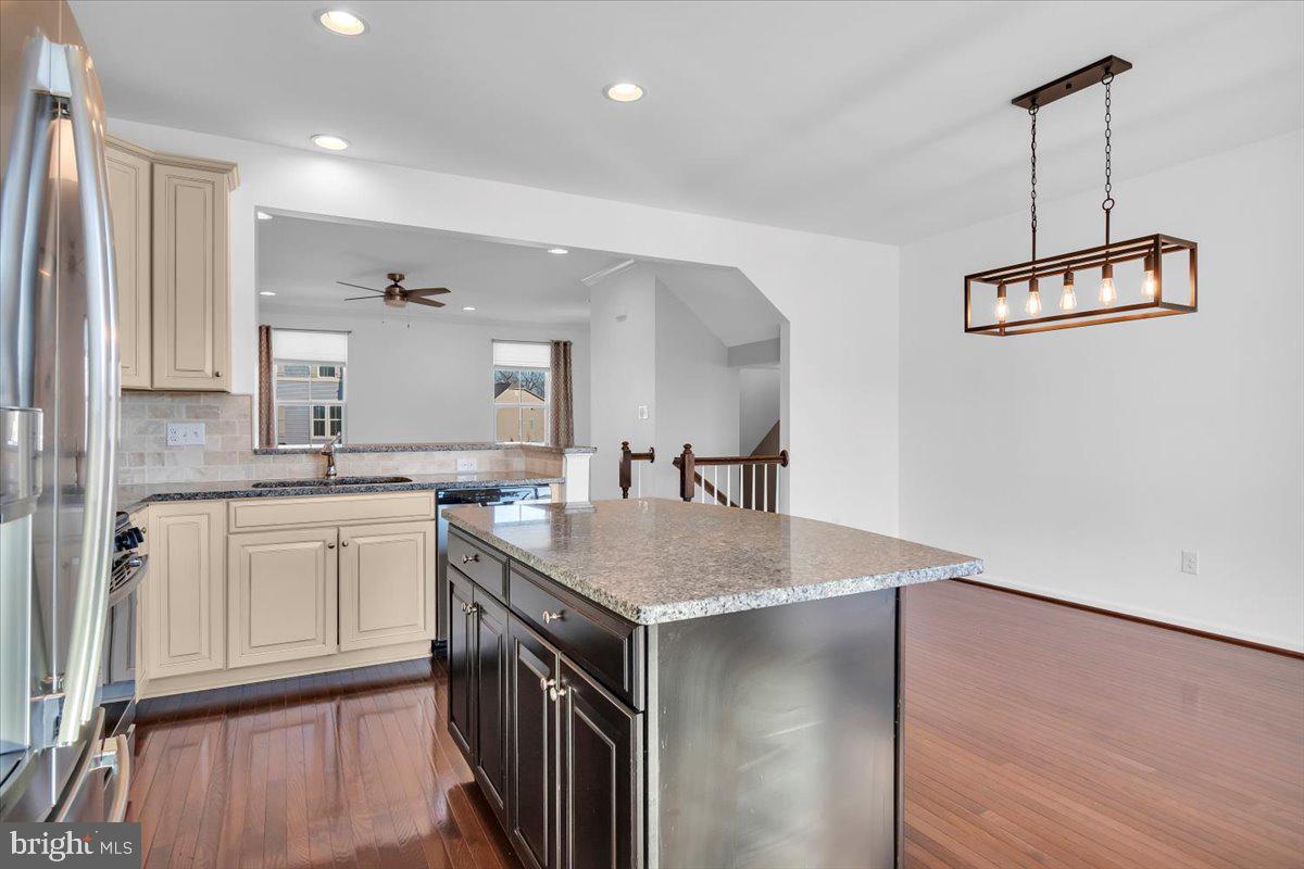 262 Iannelli Road Clarksboro, NJ 08020 - Photo 14 of 39 a kitchen with stainless steel appliances granite countertop a sink a stove and a wooden floors