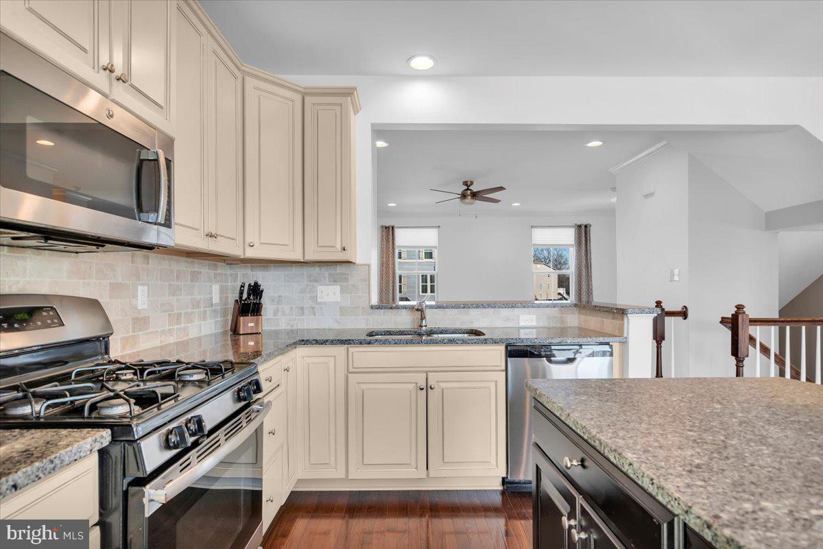 262 Iannelli Road Clarksboro, NJ 08020 - Photo 15 of 39 a kitchen with granite countertop a sink stove and cabinets