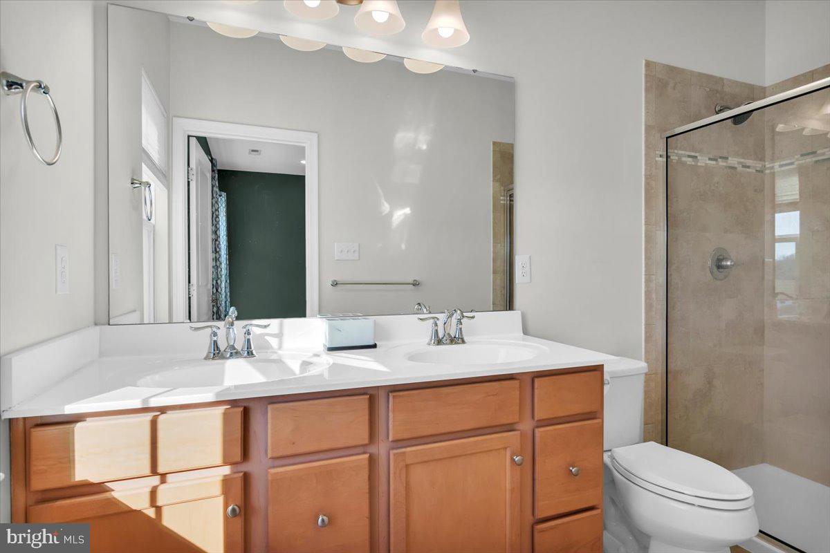 262 Iannelli Road Clarksboro, NJ 08020 - Photo 20 of 39 a bathroom with a sink a toilet and shower