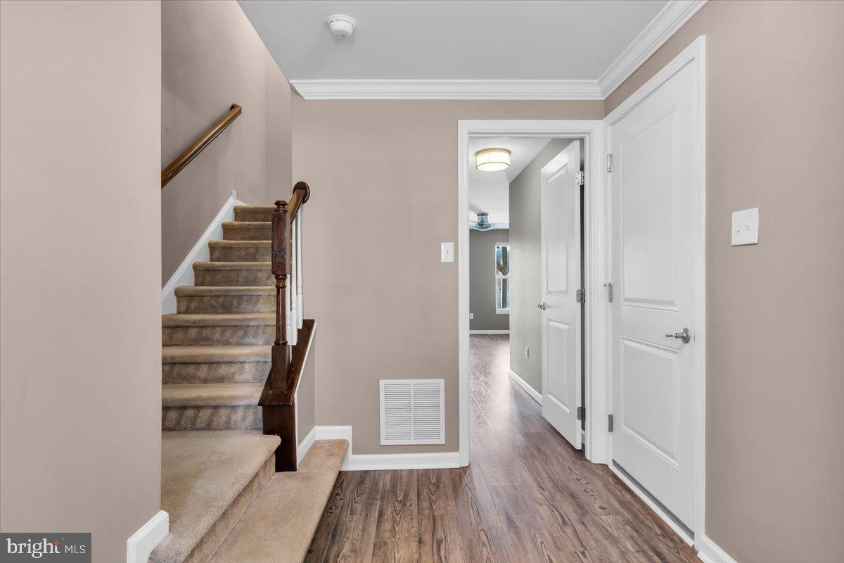 262 Iannelli Road Clarksboro, NJ 08020 - Photo 6 of 39 a view of a hallway view with wooden floor and staircase