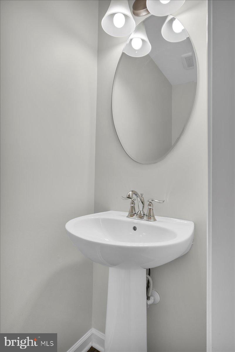 262 Iannelli Road Clarksboro, NJ 08020 - Photo 7 of 39 a bathroom with a sink and a mirror