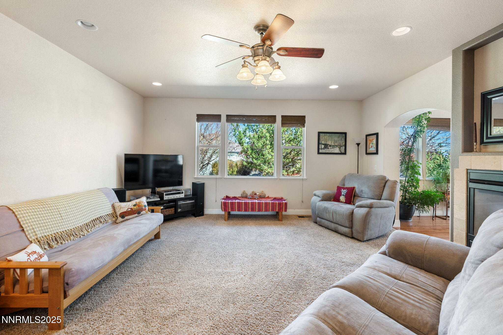 306 San Roma Drive Dayton, NV 89403 - Photo 9 of 46 a living room with furniture and a flat screen tv