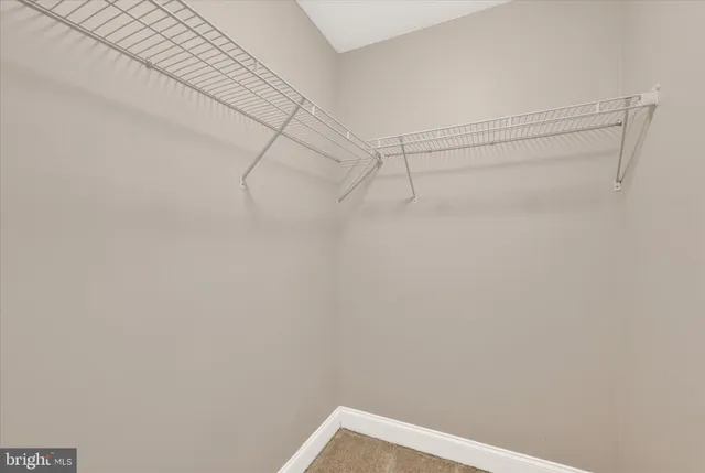 a view of small space with racks on the wall