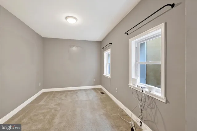 a view of a room with a large window