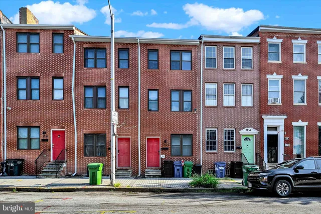 a car parked in front of a building