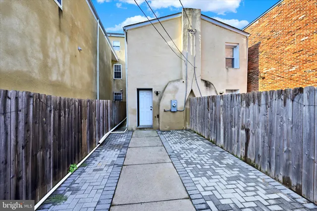 a house view with a backyard