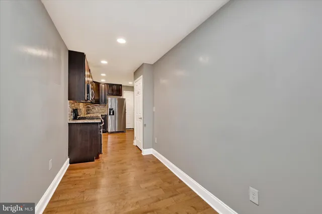 a view of a kitchen with a sink