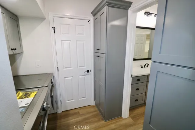 a view of an entryway with wooden floor