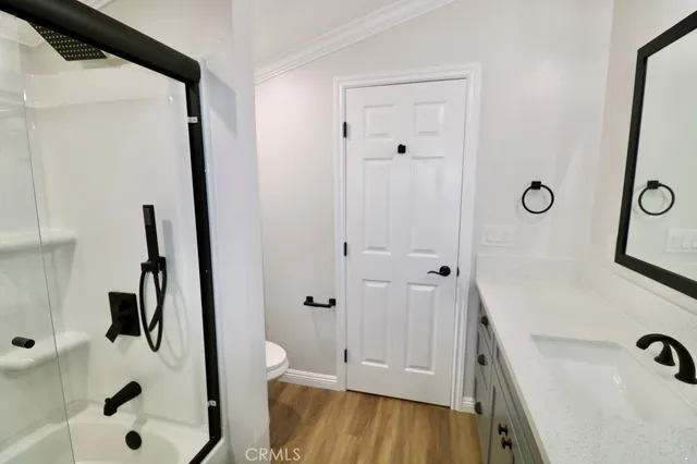 a bathroom with a tub and a sink