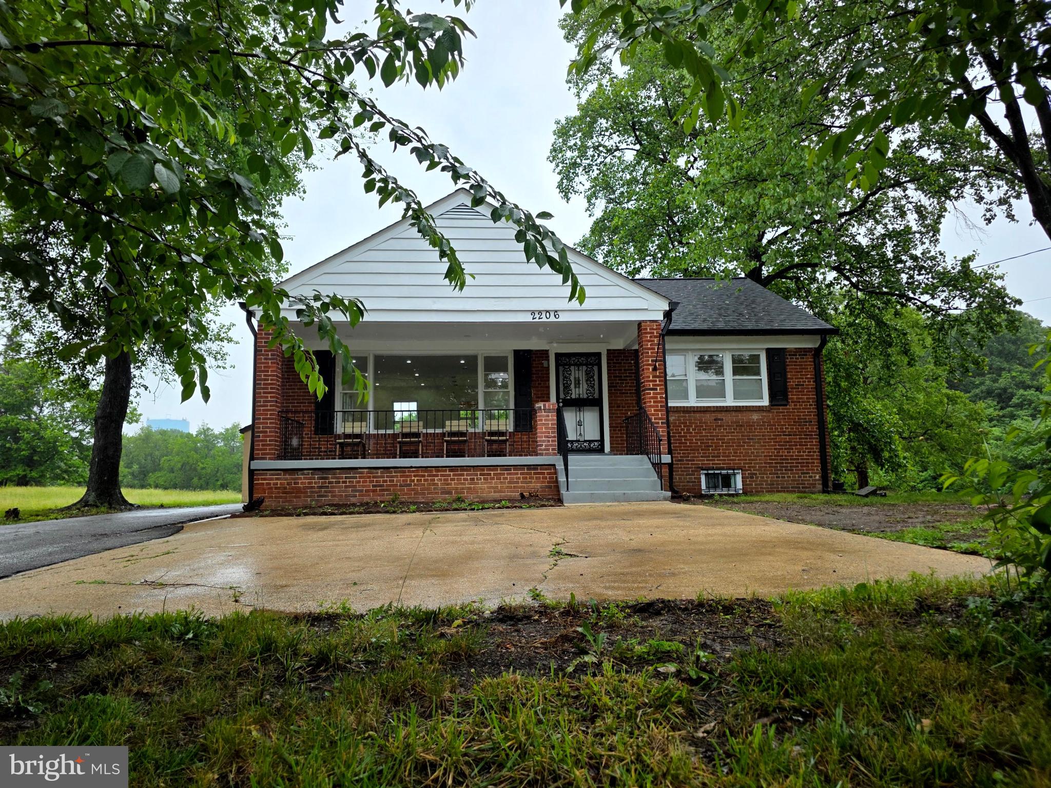 2206 Brinkley Road Fort Washington, MD 20744 - Photo 29 of 78 a view of a house with backyard porch and sitting area