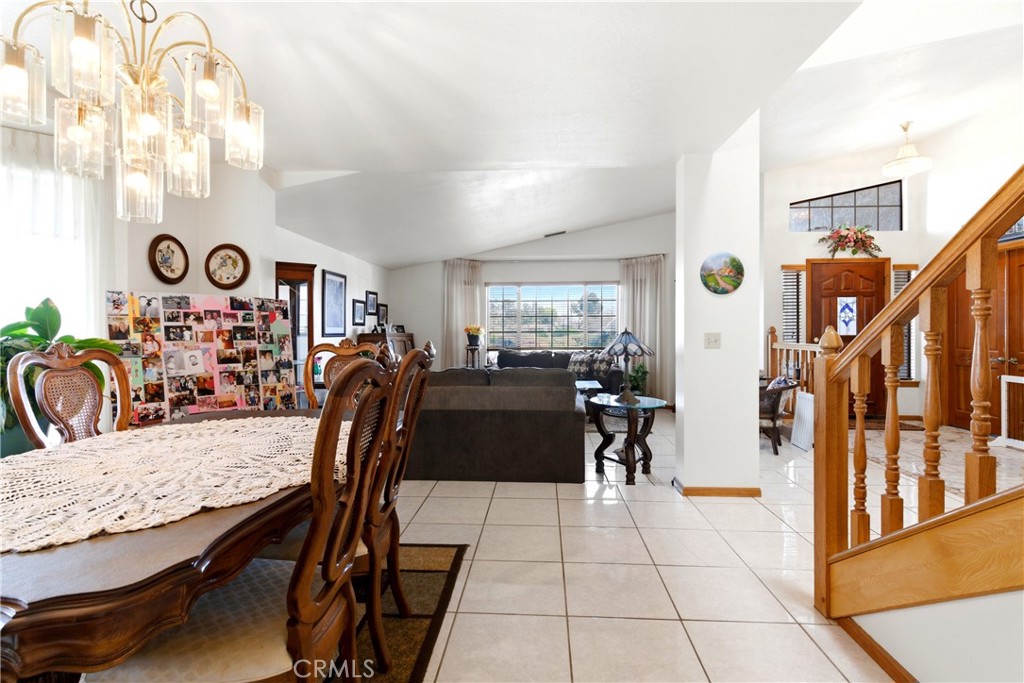 11468 Kiowa Road Apple Valley, CA 92308 - Photo 19 of 73 a view of a dining hall with furniture and a large window