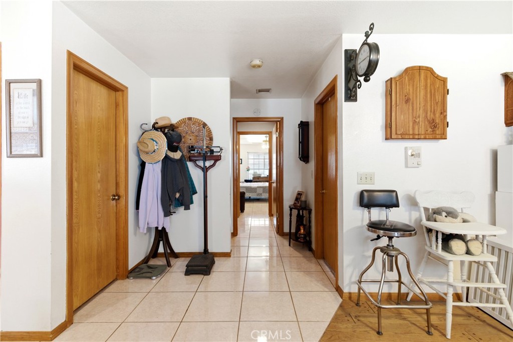 11468 Kiowa Road Apple Valley, CA 92308 - Photo 41 of 73 a view of living room with furniture and entryway