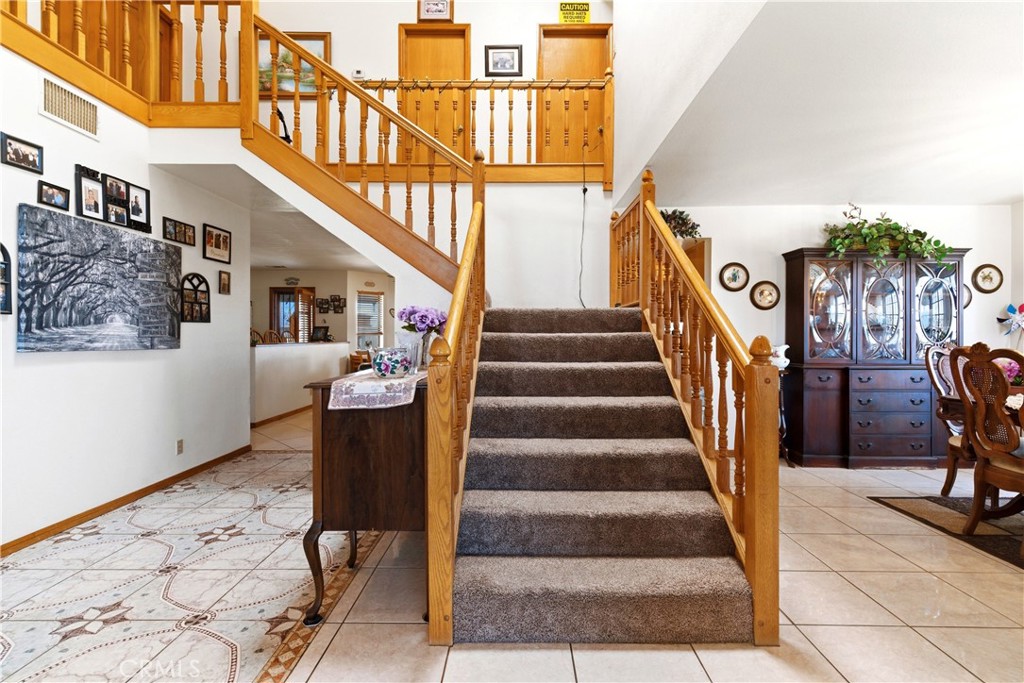 11468 Kiowa Road Apple Valley, CA 92308 - Photo 46 of 73 a view of entryway and hall with wooden floor