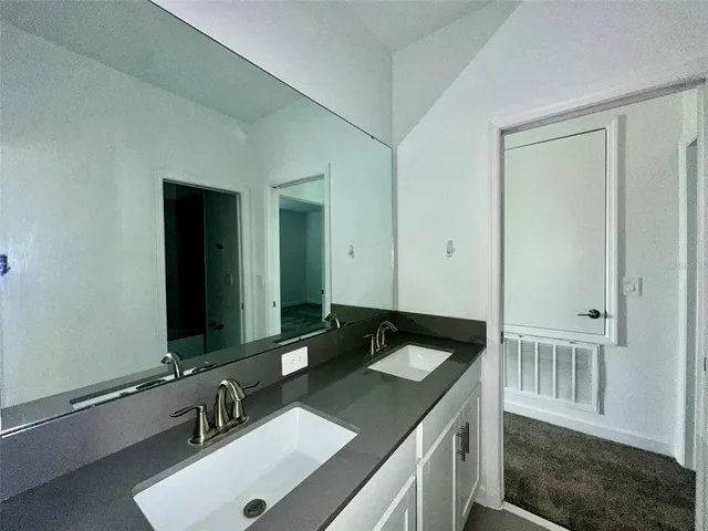 an empty room with a bathroom