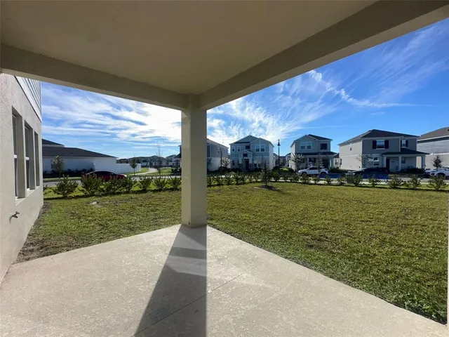 front view of a house with a garden