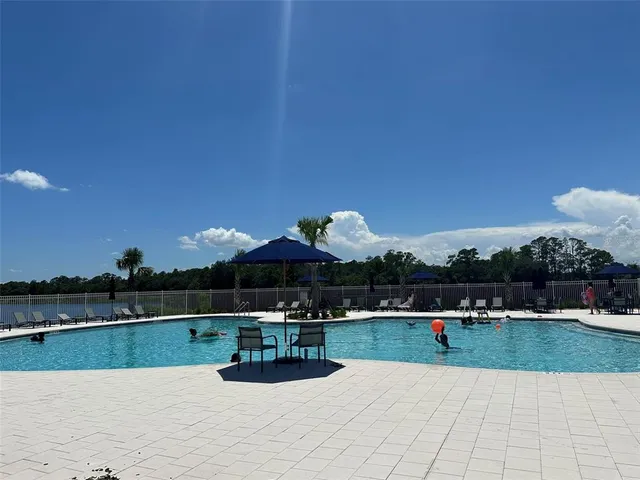 a view of a swimming pool and lake