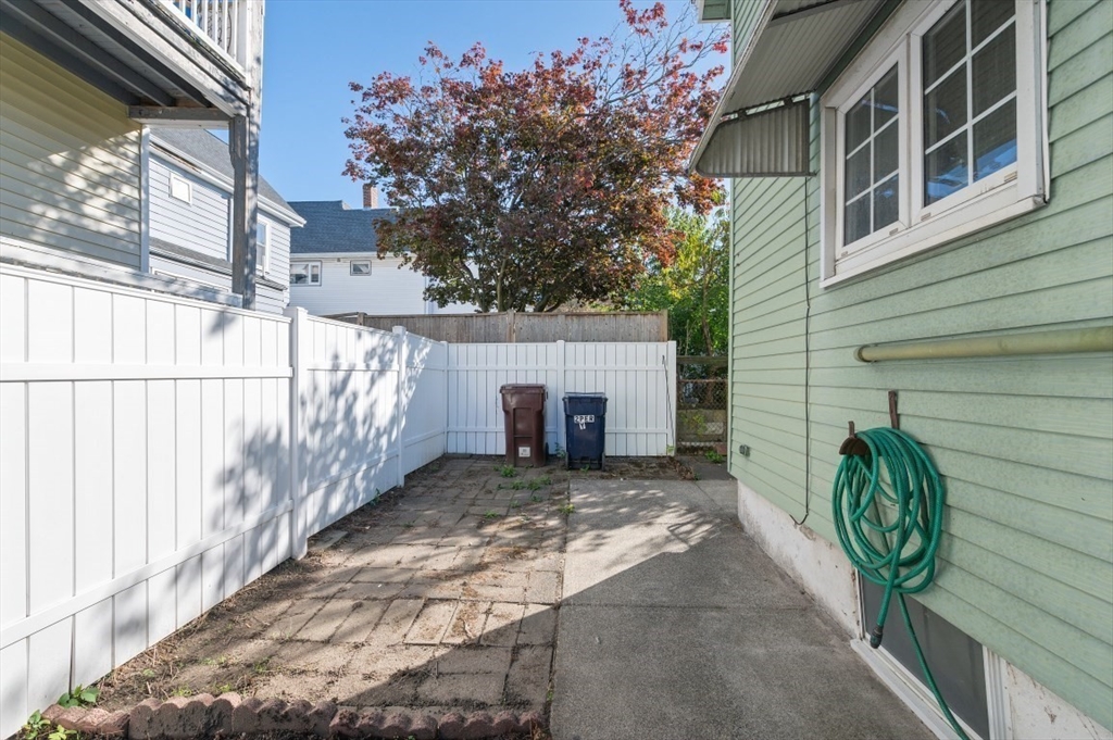 2 Perry Place Everett, MA 02149 - Photo 14 of 16 a view of a entrance gate of a house