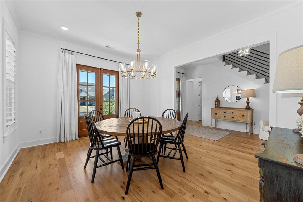 216 Wycliff Drive China Spring, TX 76633 - Photo 8 of 40 a view of a dining room with furniture and wooden floor