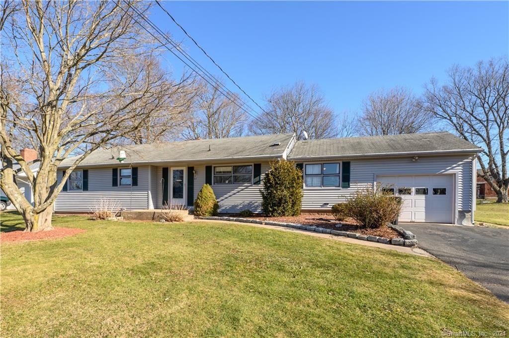 21 Jeffrey Lane Southington, CT 06451 - Photo 1 of 1 a front view of house with yard and outdoor seating