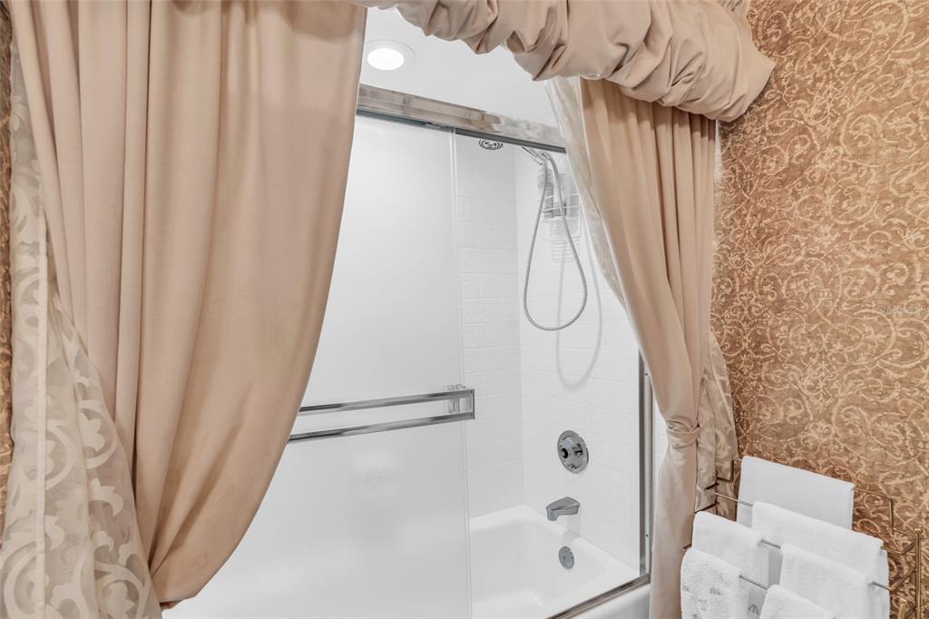 1920 Virginia Avenue, Unit 902 Fort Myers, FL 33901 - Photo 31 of 50 a bathroom with a shower