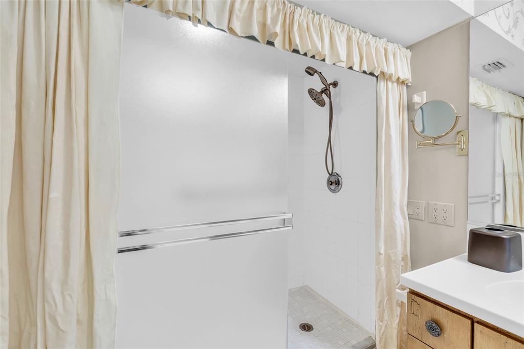 1920 Virginia Avenue, Unit 902 Fort Myers, FL 33901 - Photo 32 of 50 a bathroom with a shower