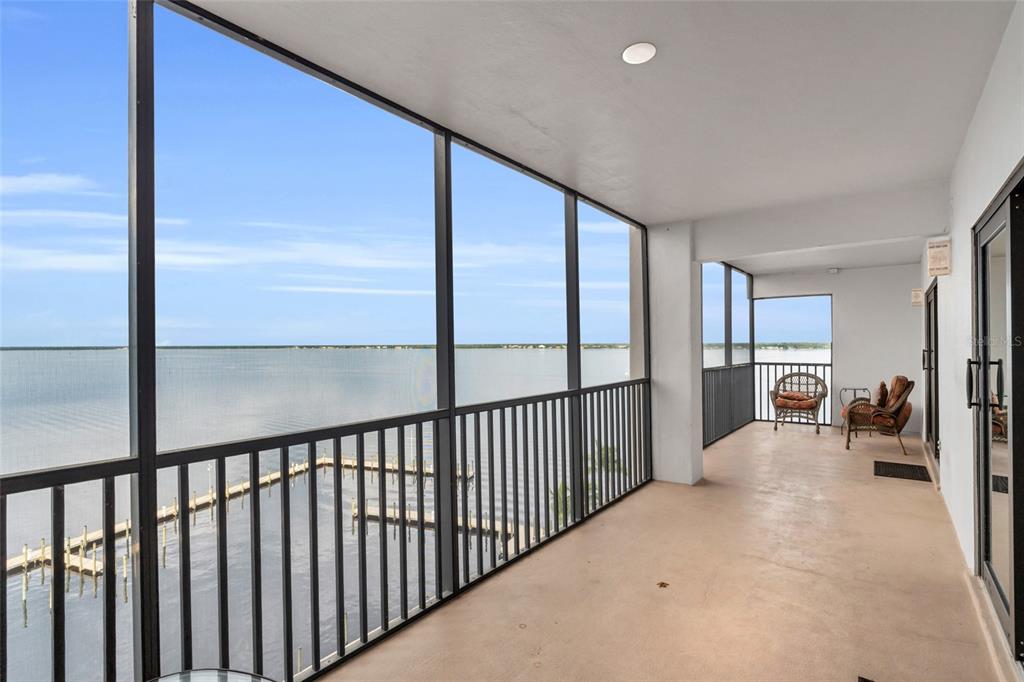 1920 Virginia Avenue, Unit 902 Fort Myers, FL 33901 - Photo 43 of 50 a view of a living room hardwood floor and a balcony