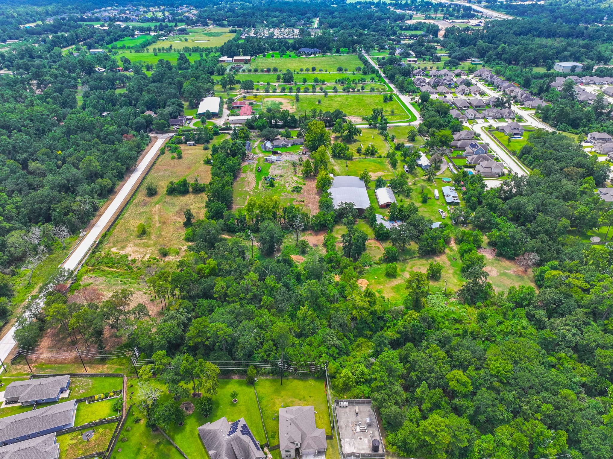 25635 Hufsmith Cemetery Road Tomball, TX 77375 - Photo 21 of 50 a view of a yard with plants