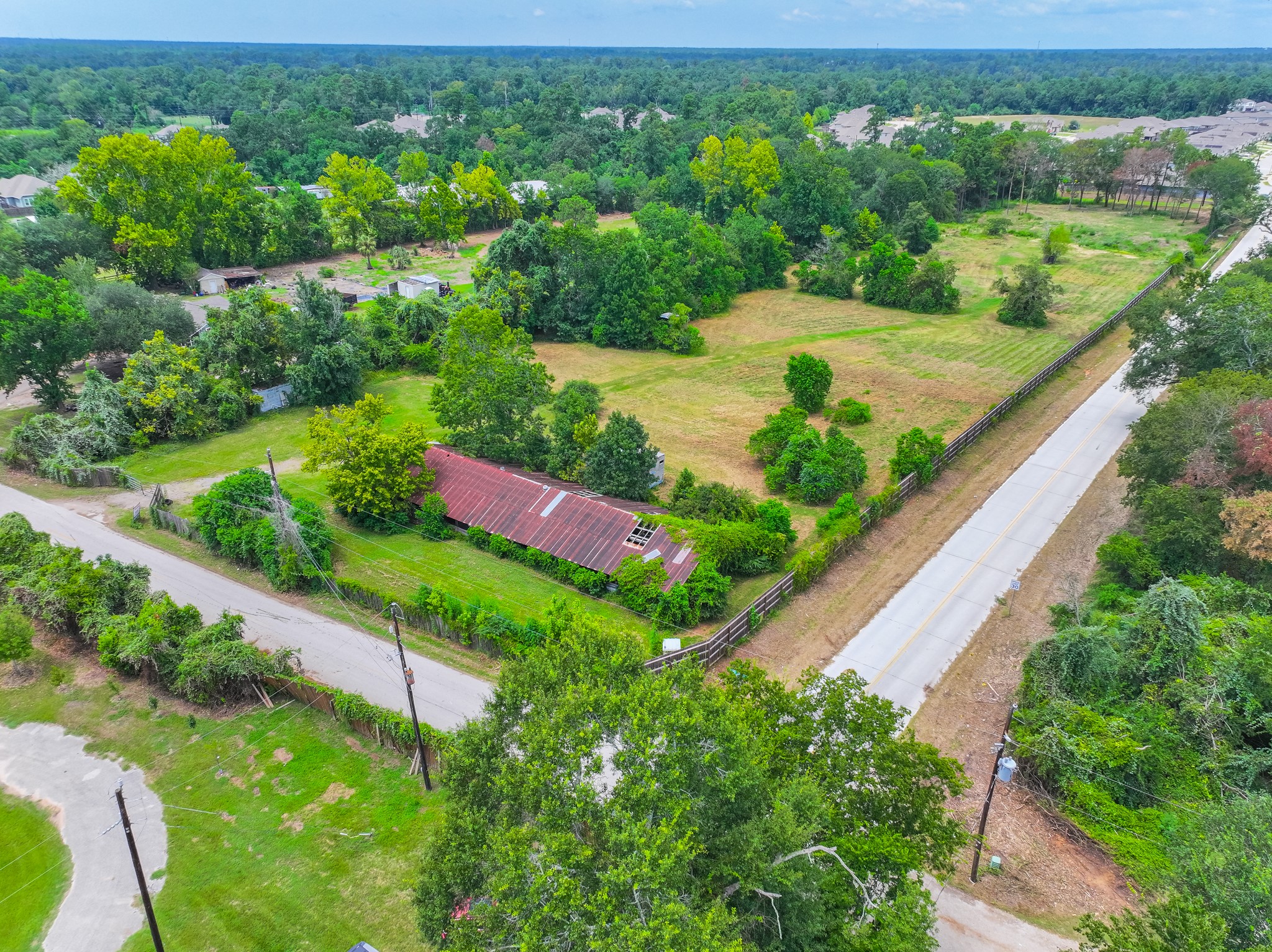 25635 Hufsmith Cemetery Road Tomball, TX 77375 - Photo 29 of 50 a view of a garden with a lake view