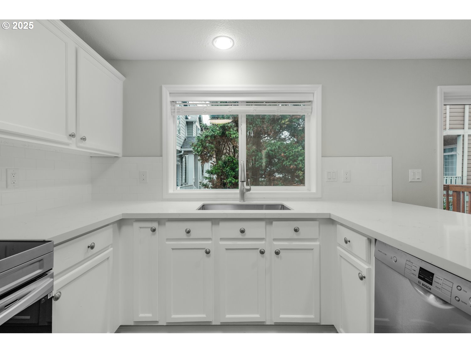 1244 Southwest 160th Avenue, Unit 104 Beaverton, OR 97006 - Photo 15 of 31 a kitchen with a sink and cabinets