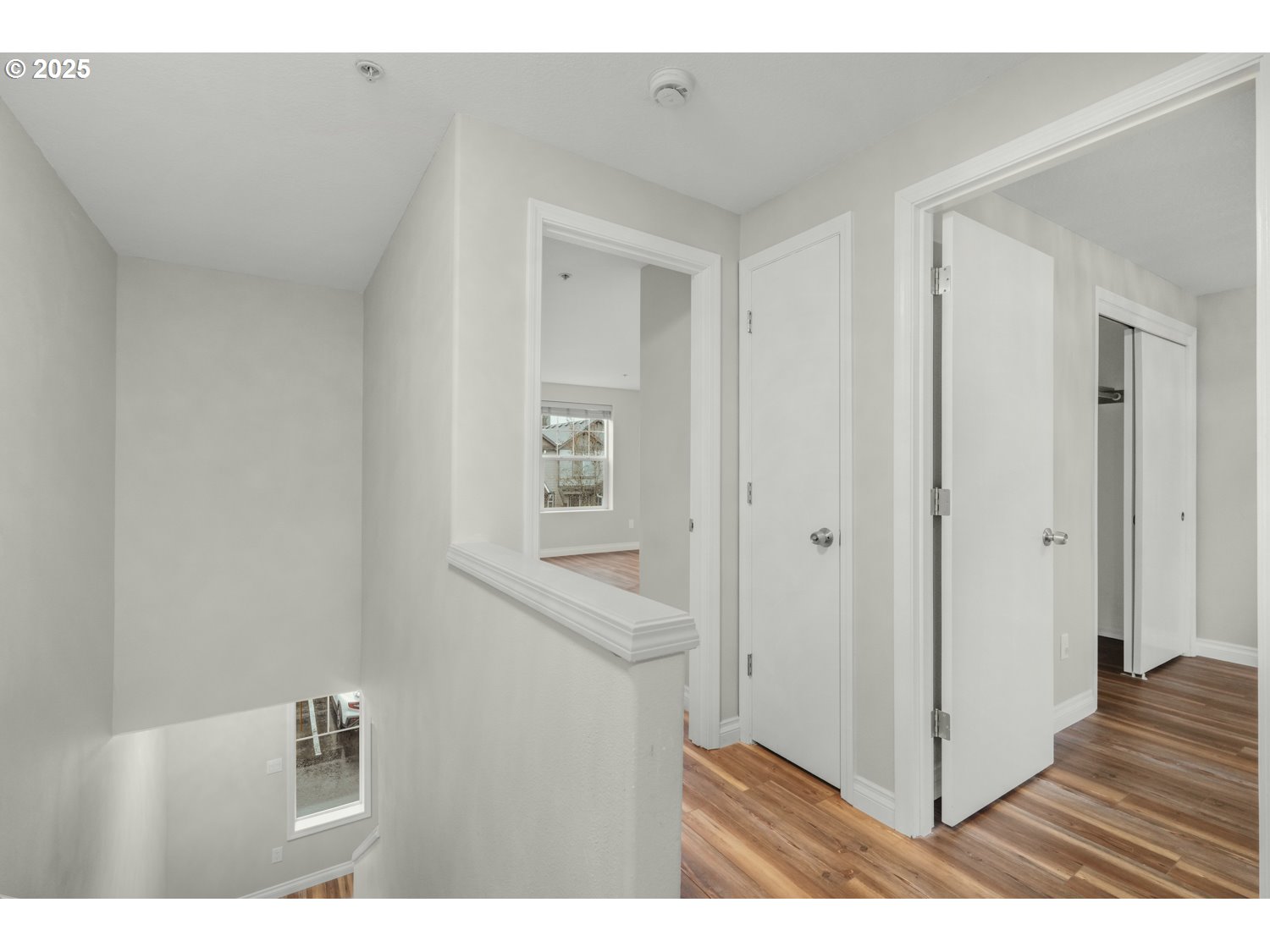 1244 Southwest 160th Avenue, Unit 104 Beaverton, OR 97006 - Photo 24 of 31 a view of hallway with wooden floor